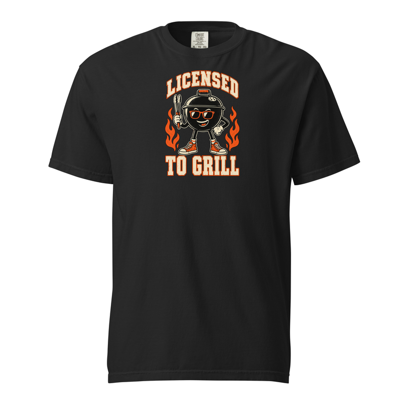 Licensed to Grill barbecue graphic printed on a Black Comfort Colors 1717 T-shirt, front view